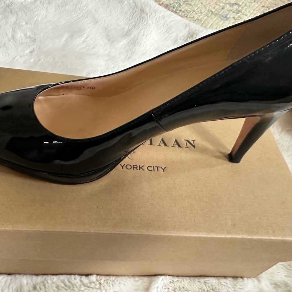 Cole Haan black patent leather heels.